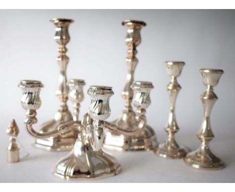 A PAIR OF CONTINENTAL PLATED TABLE CANDLESTICKS AND THREE FURTHER ITEMS (6)The table candlesticks with scroll decoration, rai