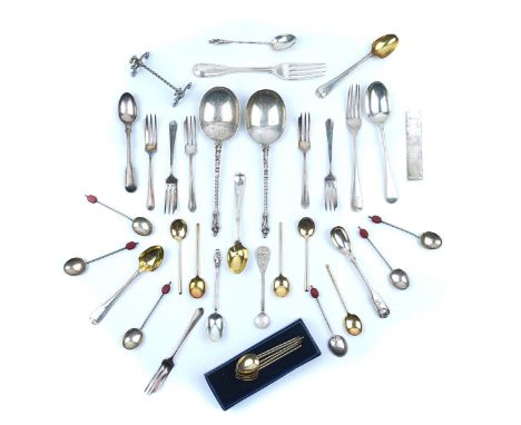 A GROUP OF SILVER, FOREIGN AND PLATED WARES (QTY)Comprising; two similar serving spoons, having figure terminals to the spira