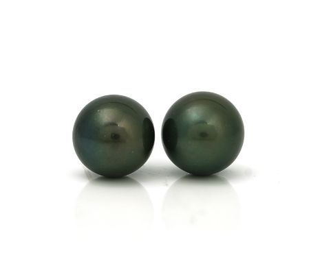 A PAIR OF GREY TINTED CULTURED PEARL EARSTUDSEach large grey tinted cultured pearl having a white gold post fitting detailed 