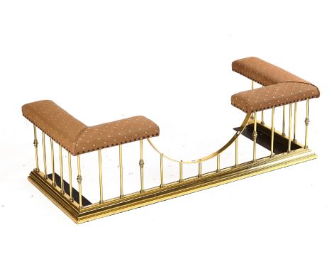 A BRASS AND UPHOLSTERED CLUB FENDERModernWith close nailed seat, 159cm wide x 64cm deep x 46cm high; internal dimensions, 123
