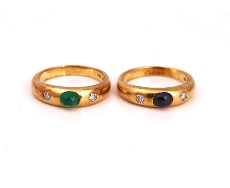 A GOLD, CABOCHON EMERALD AND DIAMOND THREE STONE RING AND ANOTHER RING (2)The first mounted with an oval cabochon emerald bet