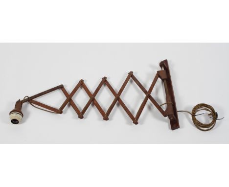 A mid century teak wood extending scissor action wall lamp, mount 45cm high x 38cm wide (closed)