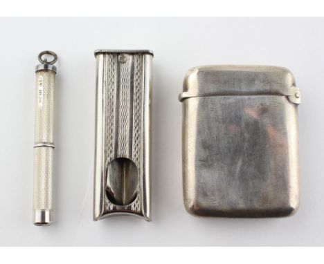 A late Victorian silver vesta case, together with a cheroot cutter and another silver cased item