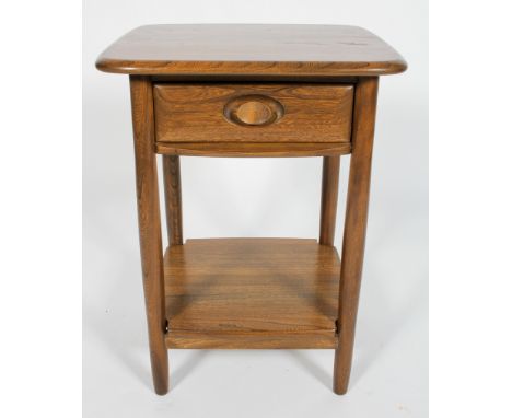 An Ercol Windsor Lamp Table, in Golden Dawn, a single drawer above a shelf, raised on round legs, 66cm high x 47cm wide x 44c