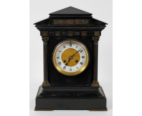 A brass mounted slate mantel clock, the white enamel dial inscribed by Charles Frodsham &amp; Co, (1810-71), with central bra