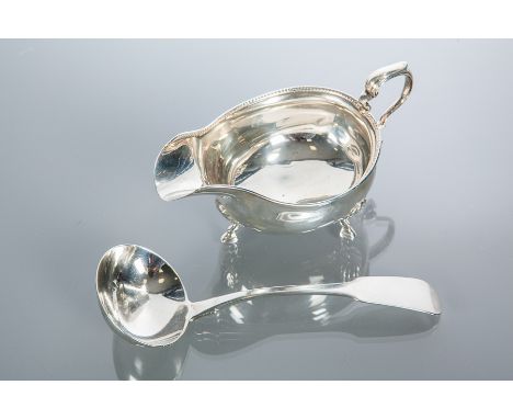 GEORGE III IRISH SILVER RATS TAIL PATTERN SAUCE LADLE
maker Samuel Neville, Dublin 1814, 17cm; together with a silver sauce b