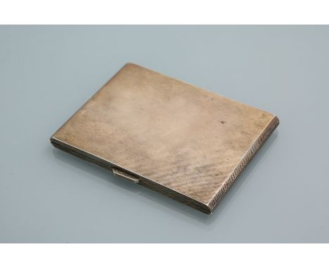 SILVER CIGARETTE CASE
maker Smith & Bartlam, Birmingham 1938, of attractive square form with engine turned body, gilt interio