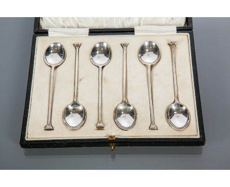 SET OF TWELVE SILVER TEASPOONS AND TONGS
maker Cooper Brothers & Sons Ltd., Sheffield 1918, in fitted case, each 12.5cm; toge