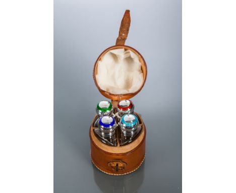 SET OF FOUR EDWARDIAN SILVER ENAMELLED SCENT BOTTLES
mounted by Levi & Salaman, Birmingham 1902, lids with a circle of enamel