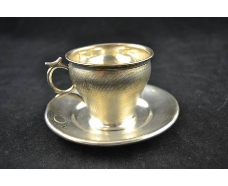 A French 1st standard silver cup and saucer decorated with engine turning, maker AN - approx weight 141g/4.5 troy oz CONDITIO