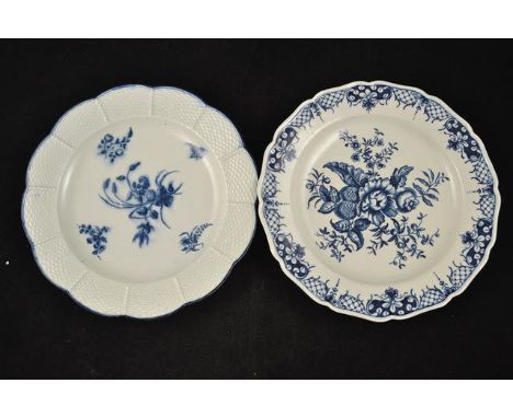 A First Period Worcester plate with blue floral decoration, diam 22cm (hatched crescent mark); together with a First Period p