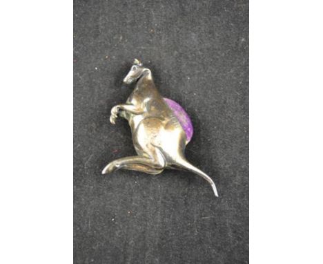 A silver pincushion in the form of a kangaroo, Birmingham 1909, maker Adie & Lovekin - H6.5cm CONDITION REPORT: purple pin cu