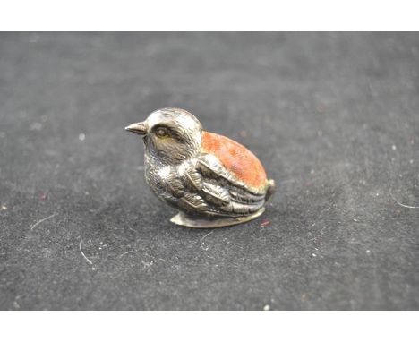 A silver pin cushion in the form of a bird, Birmingham 1907, maker Levi & Salaman - Length 4.2cms - approx gross weight 8.3g 