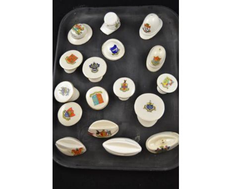 Seventeen items of 1st WW crested china - 2 Tommie's Helmets, 2 Pith Helmets, 1 French Cap, Forage Caps and 8 Officers Caps. 