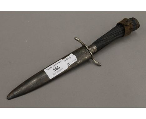 A German dagger in scabbard, the blade inscribed ED WUSTHOF SOLINGEN. 28 cm long.