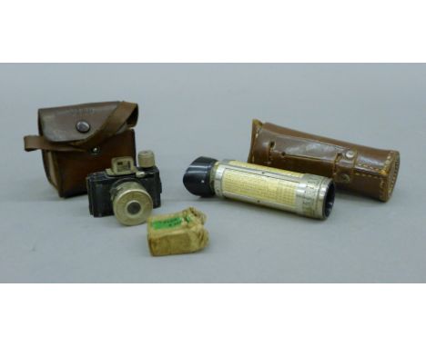 A 1935 Ulca STI camera and two spare film rolls and BEWI extinction light meter in a leather case. The former 4.5 cm wide.
