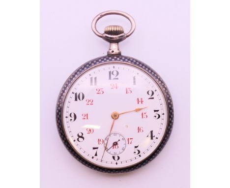 A niello silver pocket watch.  5 cm diameter. 