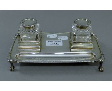 A silver desk stand with cut glass inkwells. 20 cm wide. 12.2 troy ounces.