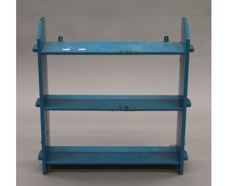 A Victorian blue painted hanging shelf. 56 cm wide.