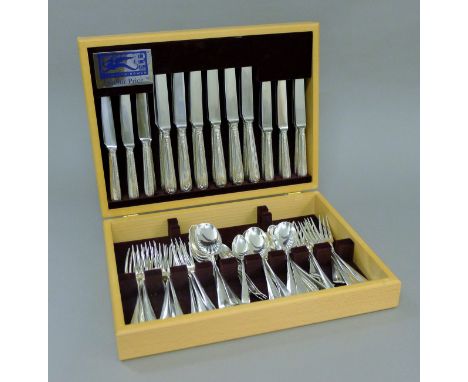 A composite 12-setting canteen of Old English pattern silver flatware.  The canteen 13.5 cm wide.