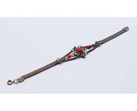 An antique carnelian silver bracelet.  17 cm long. 