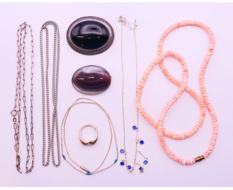 A quantity of various silver jewellery, including necklaces, brooches and a ring.