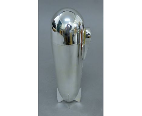 A silver-plated Zeppelin cocktail shaker. 24 cm high.