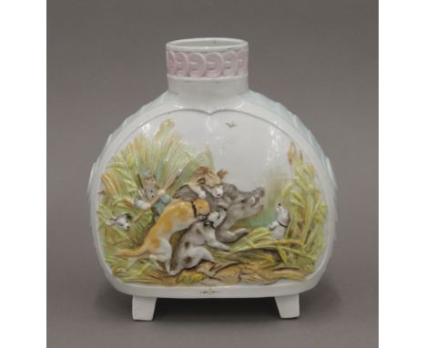 A 19th century Continental porcelain vase decorated with hunting scenes. 21.5 cm high.