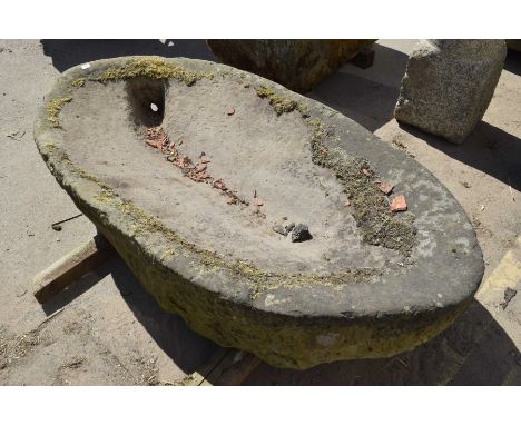 An unusual oval sandstone troughThe shallow trough with a single drain hole  is ideal for conversion to a garden water featur