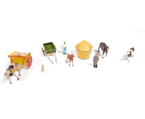 A quantity of metal farm animals and figuresMainly by Britains and Johillco, including horse and cart, hayrick, sheaves, hors