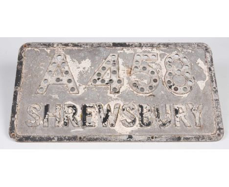 A vintage cast iron road sign The black and white painted road sign with raised lettering 'A458 Shrewsbury' 24cm x 46cm. 