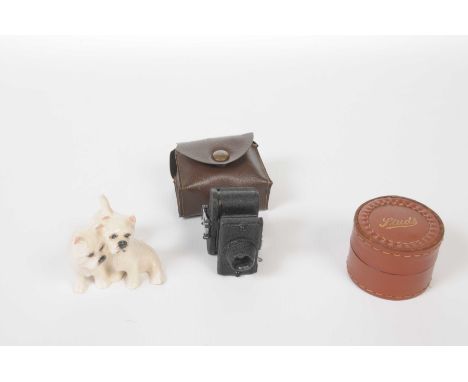 A mixed group of collectible items To include a vintage c.1940's/50's miniature camera and case, a Beswick figure of two West