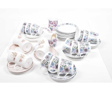 A collection of vintage, Elizabethan and Susie Cooper teawaresTo include 'Carnaby' pattern, 12 teacups, 11 saucers, 11 tea pl