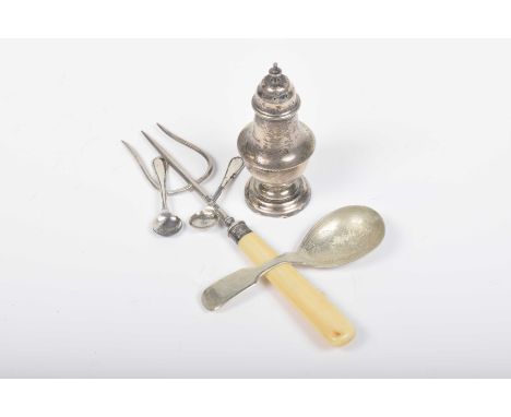 A collection of Georgian and Victorian silver itemsTo include a Caddy spoon, a silver pepperette, a silver and ivorine handle