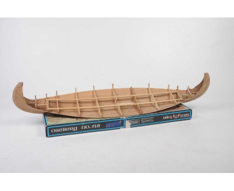 A quantity of remote control equipment, engine and other accessoriesAnd a balsa wood viking longboat 