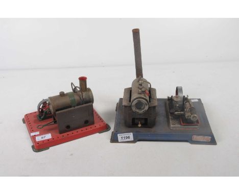 Two live steam stationary steam enginesComprising a Wilesco engine with burner and chimney with single piston and wheel and a