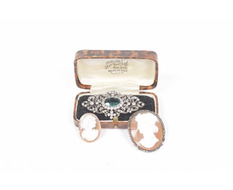 Two vintage broochesTo include a Georgian style white metal and paste brooch, and a cameo with marcasite mount. (2)