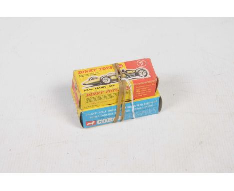Two boxed diecast racing carsComprising Dinky no. 243 BRM racing car - metallic green, yellow plastic engine cover, bun hubs,