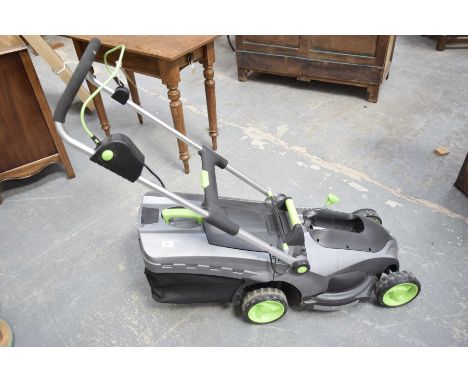A Gtech rechargeable rotary lawn mower Lacking battery.