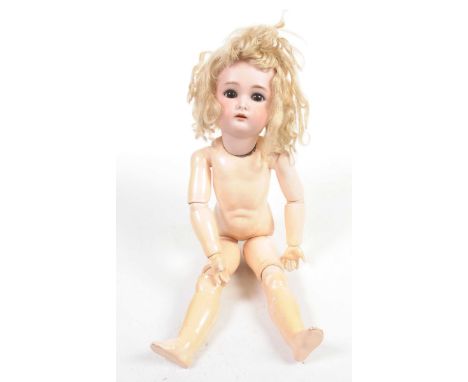 A German bisque headed dollWith blonde wig, open/shut brown eyes, open mouth, impressed mark Simon & Halbig K*&R50, with comp