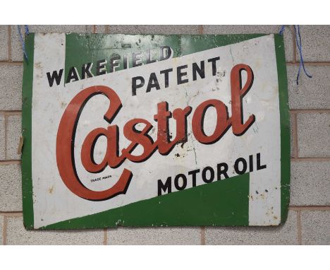 A vintage enameled 'Castrol' advertising signThe rectangular sign in typical shades red, white and green with red and black l
