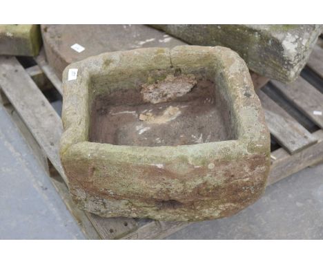 A rectangular sandstone trough of small proportions44x38cm.