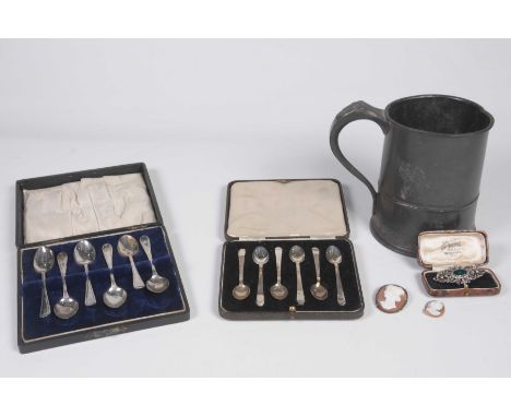 Two case sets of silver hall marked teaspoons, both Sheffield, 20th CenturyTogether with a 19th Century pewter quart mug.