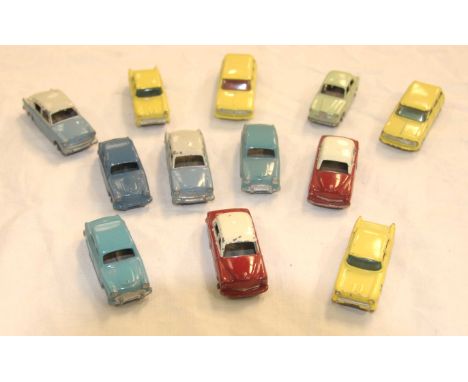 Twelve unboxed diecast Matchbox regular wheel vehiclesComprising three x Austin A50, Wolseley 1500, two further saloons in ma