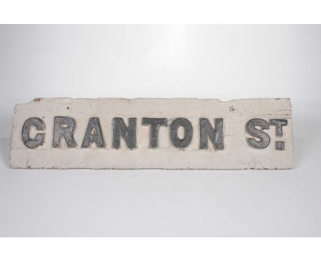 A vintage wooden street signThe sign painted black and white, with raised black lettering 'Cranton St' 23cm x 91.5cm. 