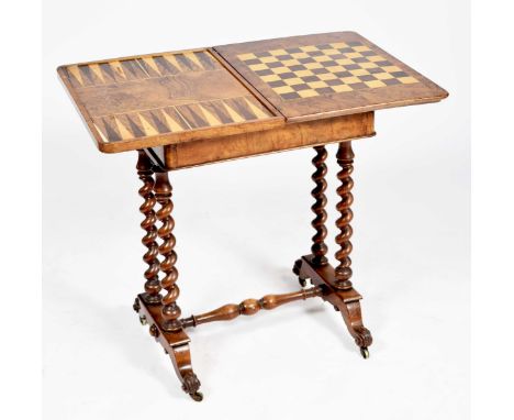 A Victorian burr walnut folding games tableThe rectangular thumb moulded top enclosing a checkered games table and a backgamm