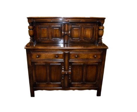 Ercol Sideboard with Tudor Style Influence, In Lovely Condition From The 1960's. Height 49 Inches, Width 48 Inches & Depth 17