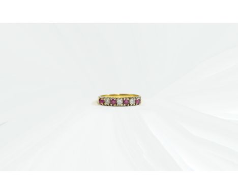 Ladies 18ct Yellow Gold Set Ruby and Diamond Channel Set Ring. The Rubies and Diamonds of Good Grade. Fully Hallmarked for 18
