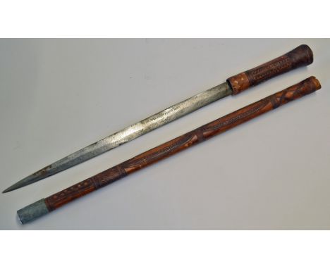 Somali Sword Stick measures 60cm approx., with blade measuring 35cm approx. wood and decorated leather scabbard and handle, a