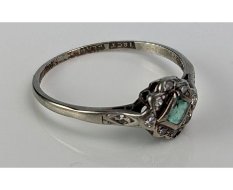 An Emerald and Old Cut Diamond Ring in an 18ct white gold and platinum setting, early 20th century, size P, 1.81g 